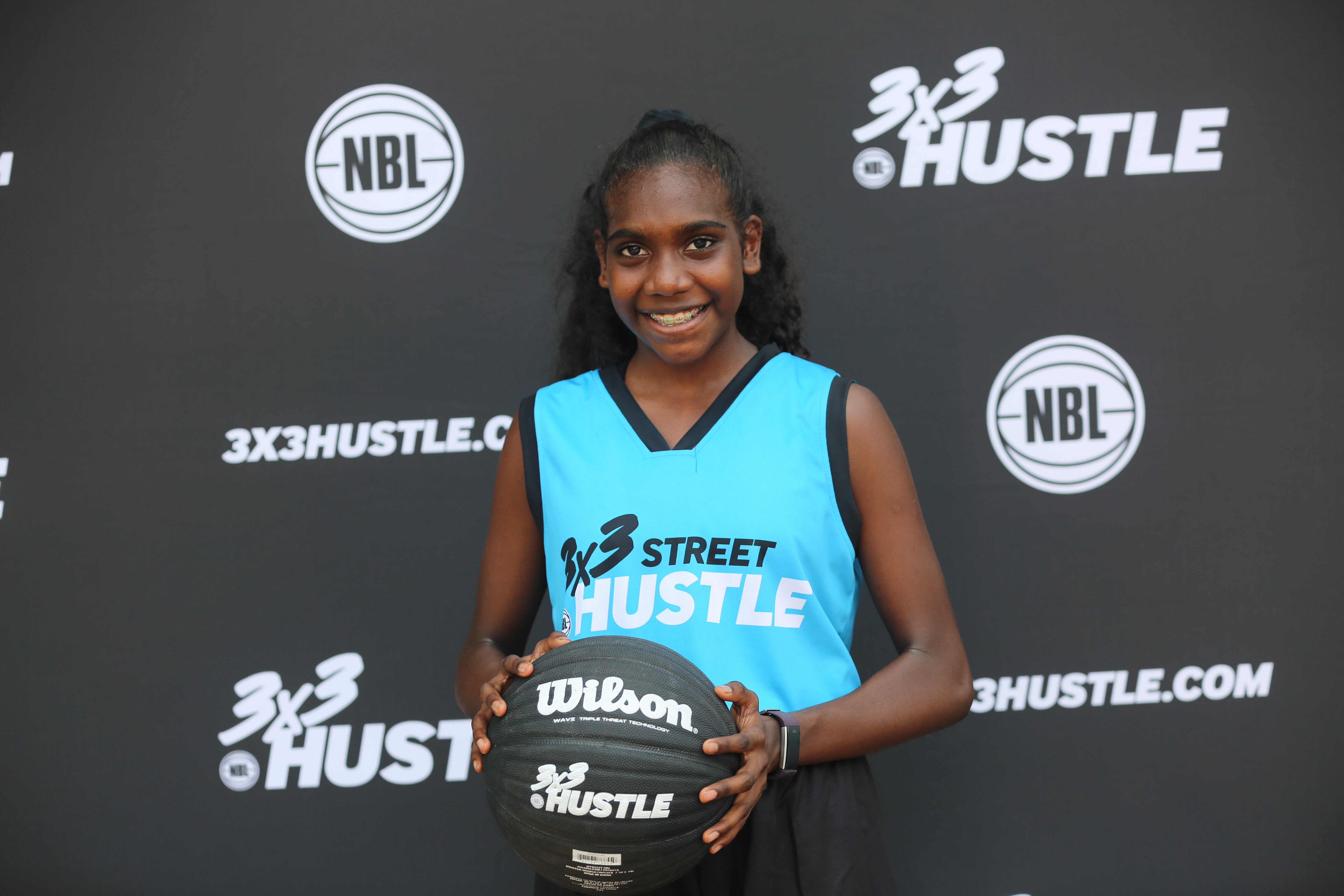 CJ poses in her 3x3 Street Hustle gear